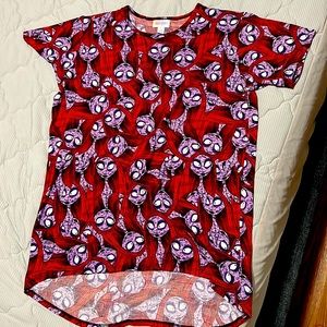 Children size 14 top with jackskelington and the female from character